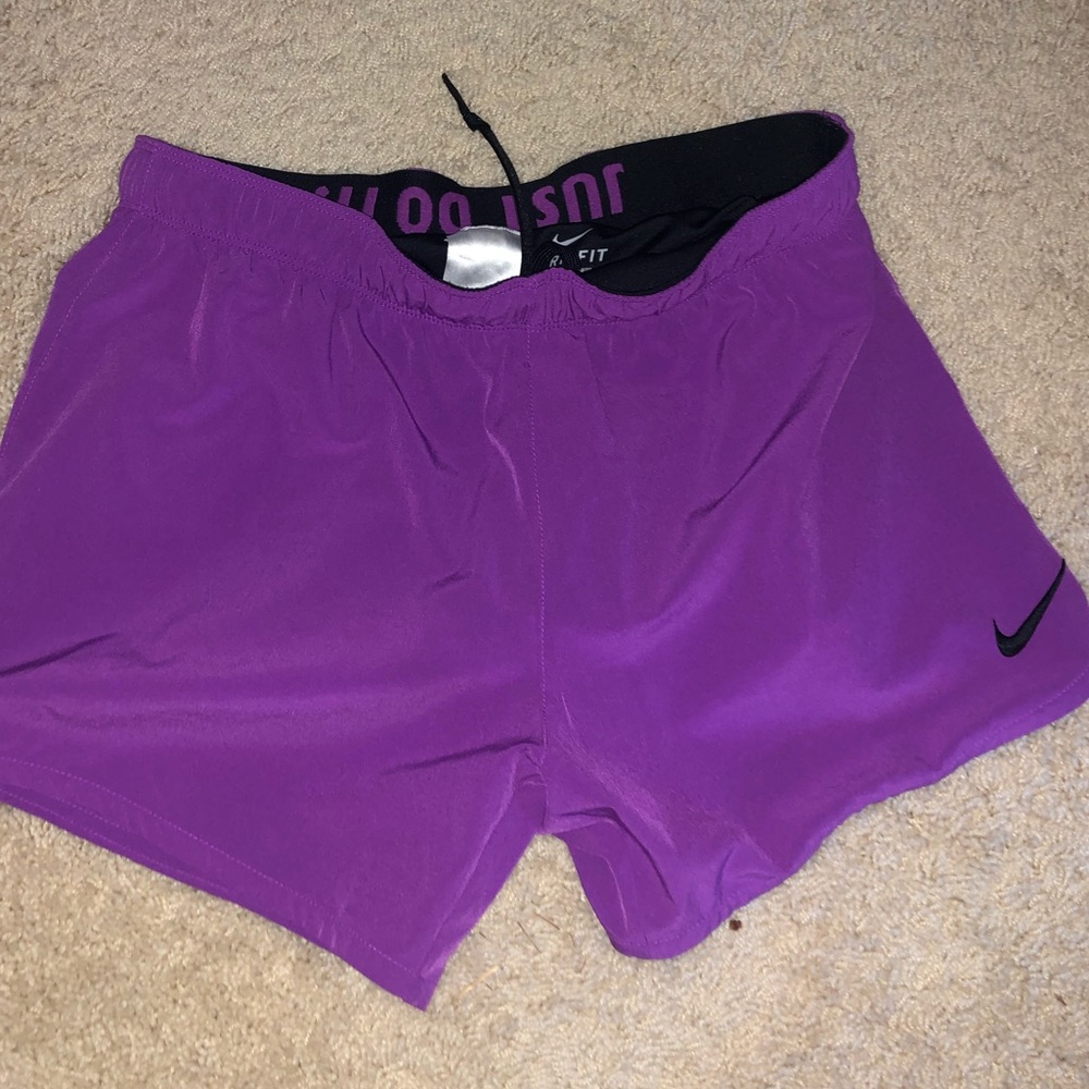 Purple NIKE shorts